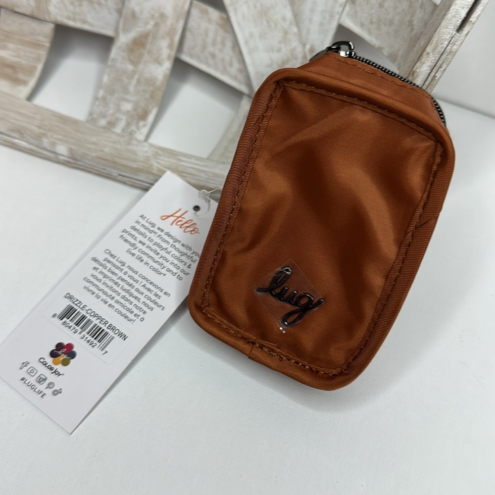 New with tags! Lug zipper mini pouch the drizzle in copper brown with carabiner